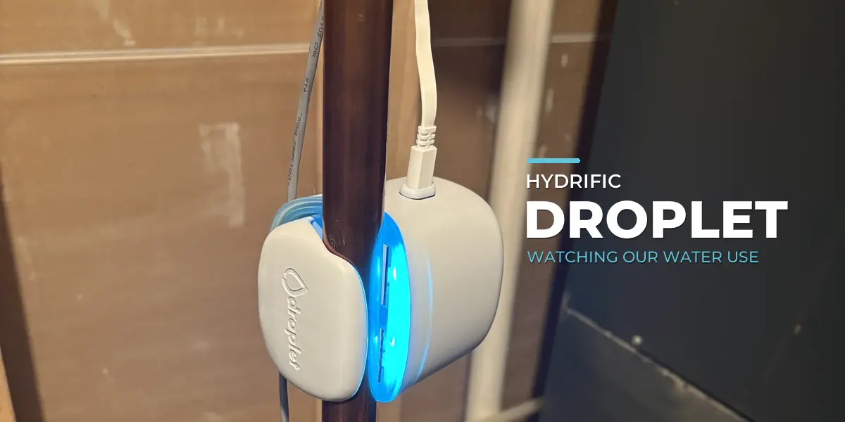 Hydrific Droplet mounted on a copper water pipe with a blue status light